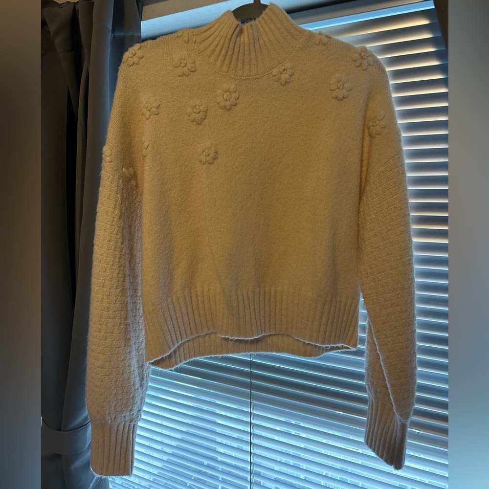 Cream Turtle Neck with Flower Details